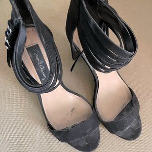 Woman’s high heel sandal with zipper back.